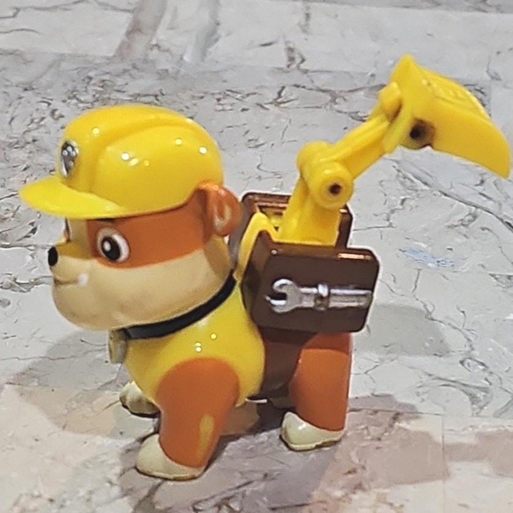 Paw Patrol Rubble Action Figure with Transforming Excavator Pup Pack Spin Master